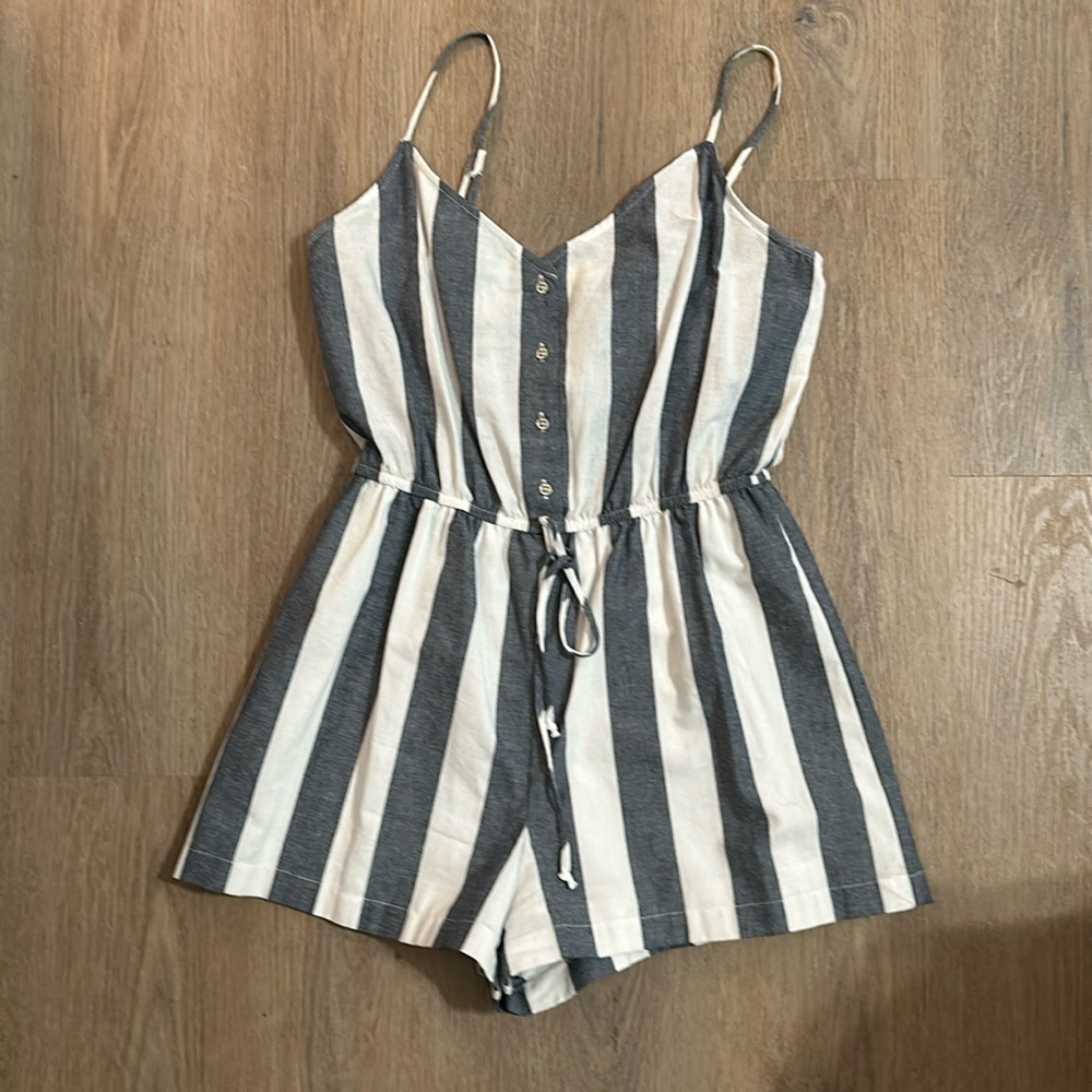 Romper Size Small. Like new! Color is greyish/blue